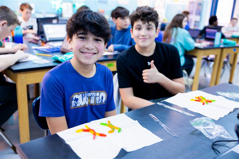 Middle school students in science class